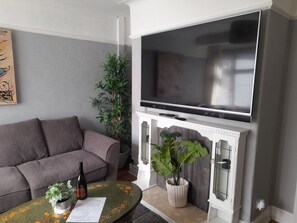 Ferienhaus | Wohnbereich | Fernseher
