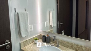 Basic Apartment | Bathroom | Shower, rainfall showerhead, hair dryer, towels