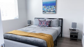 Apartemen Keluarga | 2 kamar tidur, setrika/meja setrika, Wi-Fi gratis, dan seprai linen