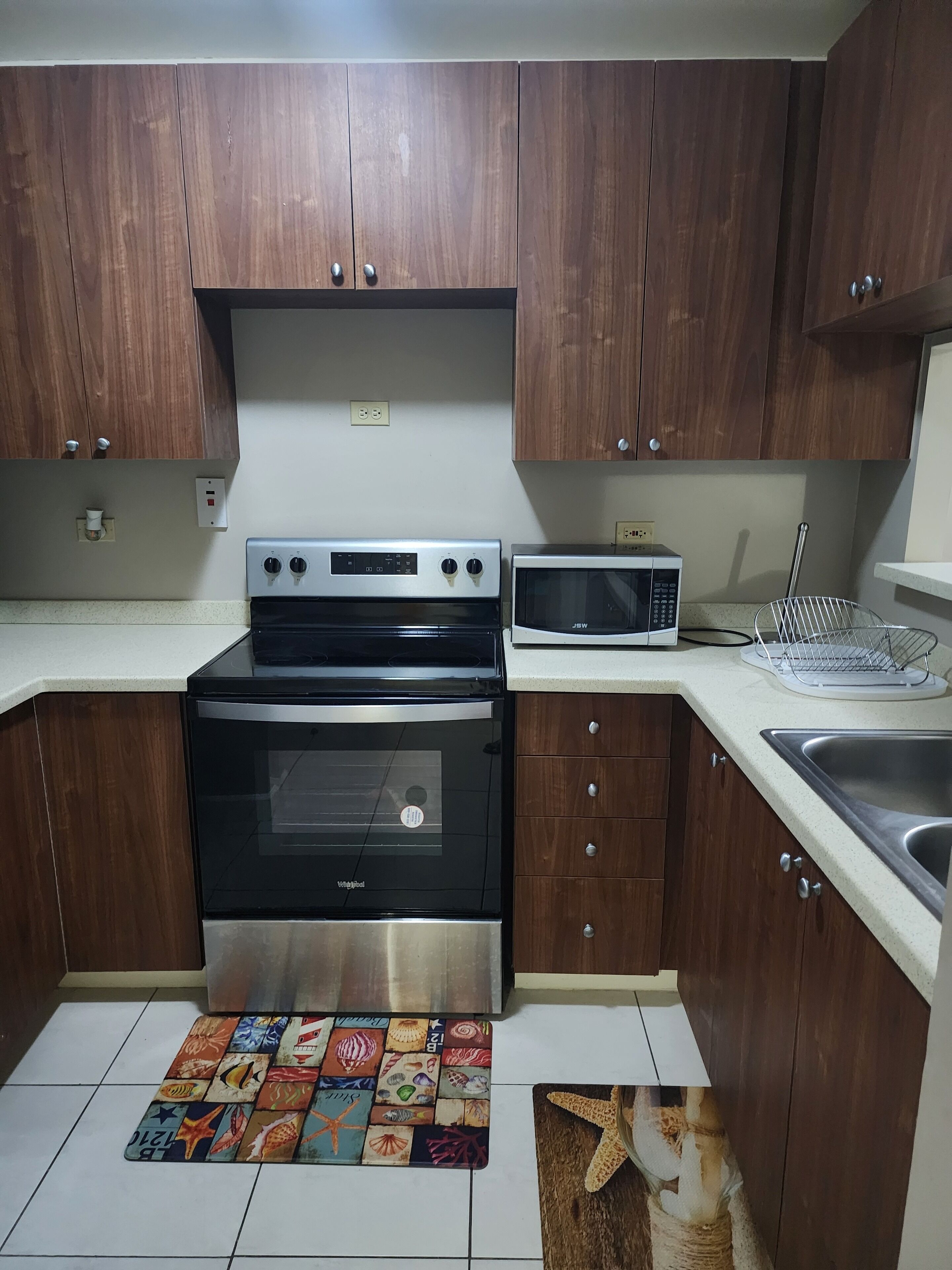 standard studio suite | private kitchen | fridge, microwave, cookware/dishes/utensils