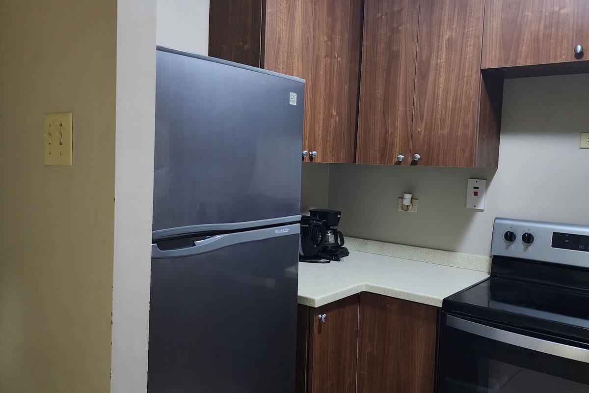 standard studio suite | private kitchen | fridge, microwave, cookware/dishes/utensils