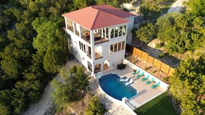 Exterior - Relax & Play in Style: Luxury Home w/ Infinity Pool, Game Room & Alfresco Dining (Jonestown)