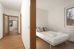 Bloc d'apartaments prèmium | 1 dormitori, cobrellits, habitacions insonoritzades i wifi gratuïta