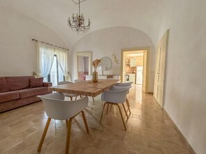 Classic Condo | Living area | Flat-screen TV - flowers apartments and rooms (Meta)