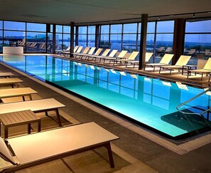 2 indoor pools, 2 outdoor pools, open 8:30 AM to 9:00 PM, pool umbrellas