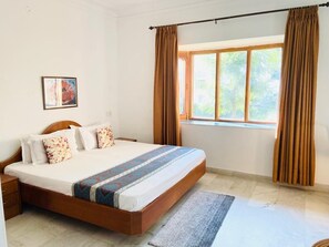 Family Room | Desk, laptop workspace, iron/ironing board, free WiFi - Fresco Hotel & Residences (Palampur)