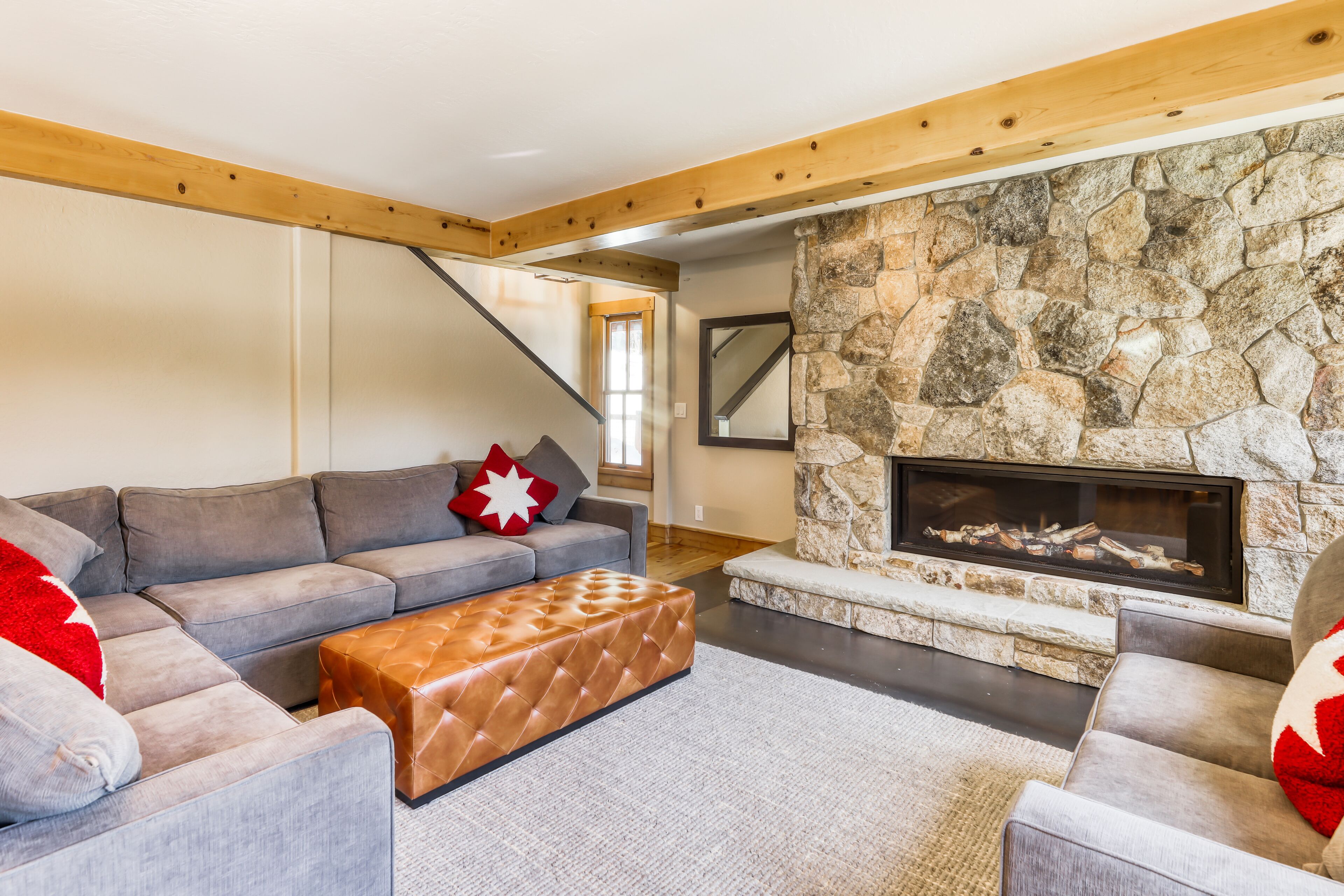 Inviting home with hot tub, fireplace, balcony, full kitchen, & W/D