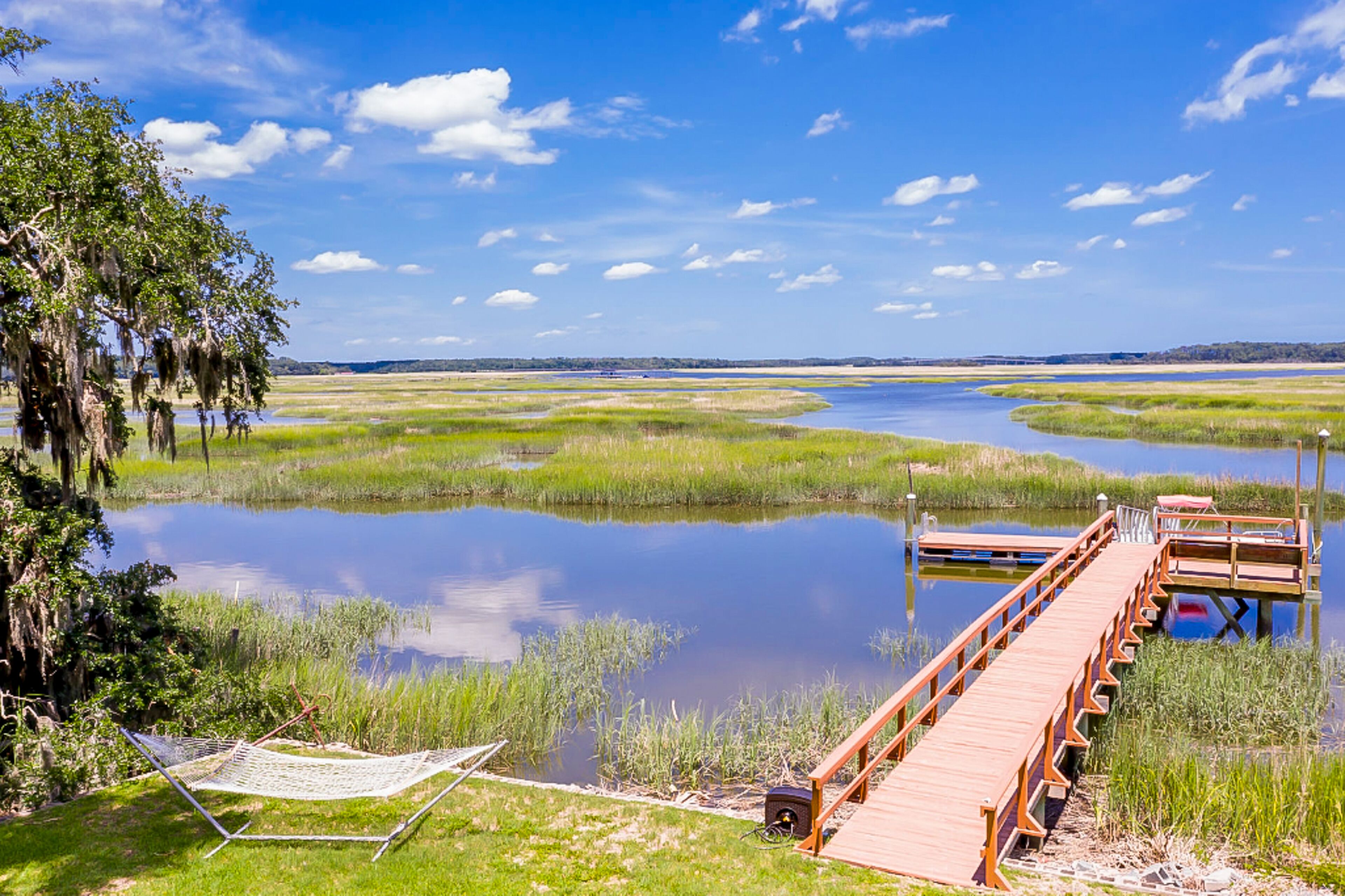 Charming 1960s home with recent upgrades, board games, & AC - on the creek
