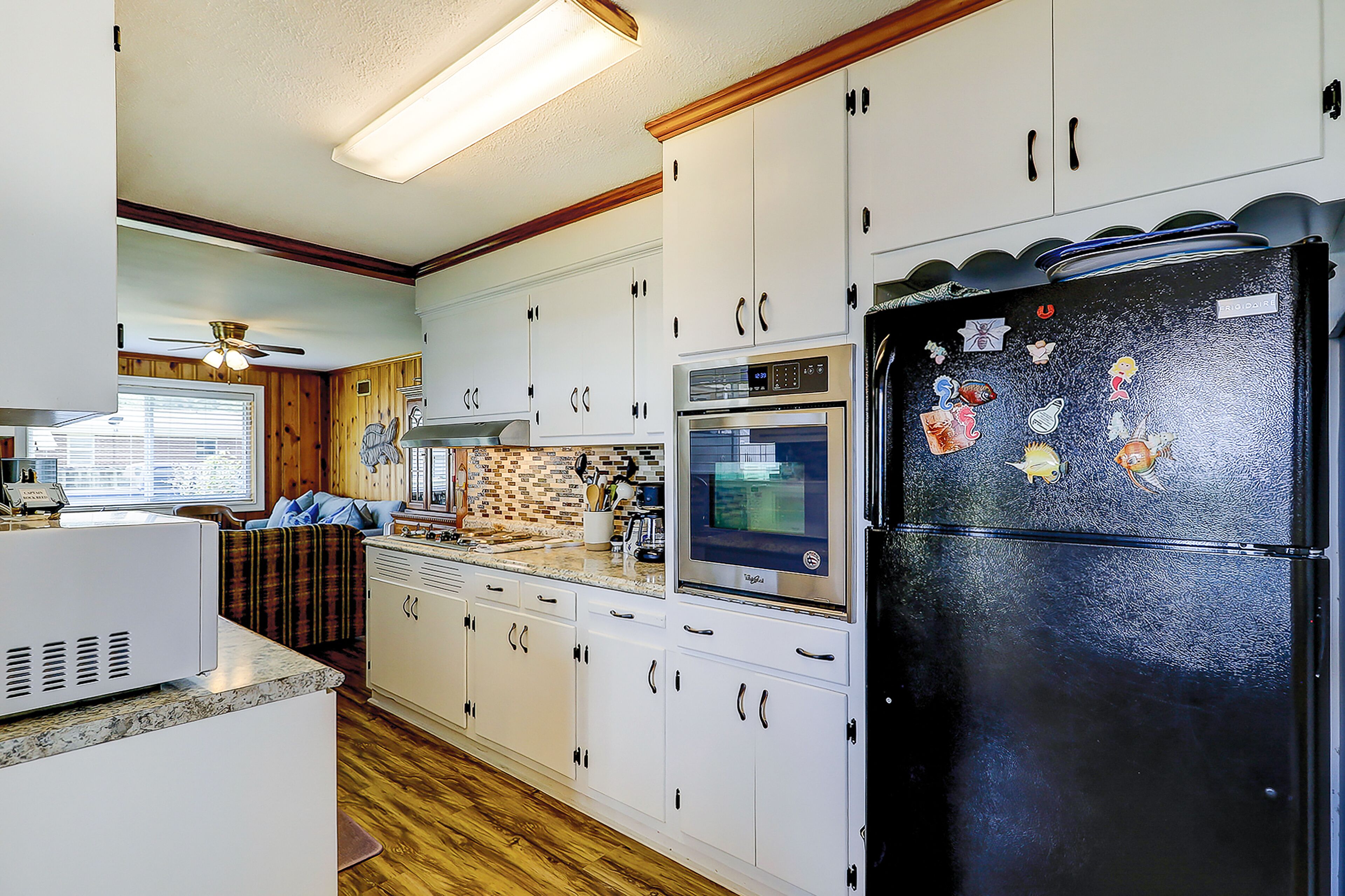 Charming 1960s home with recent upgrades, board games, & AC - on the creek