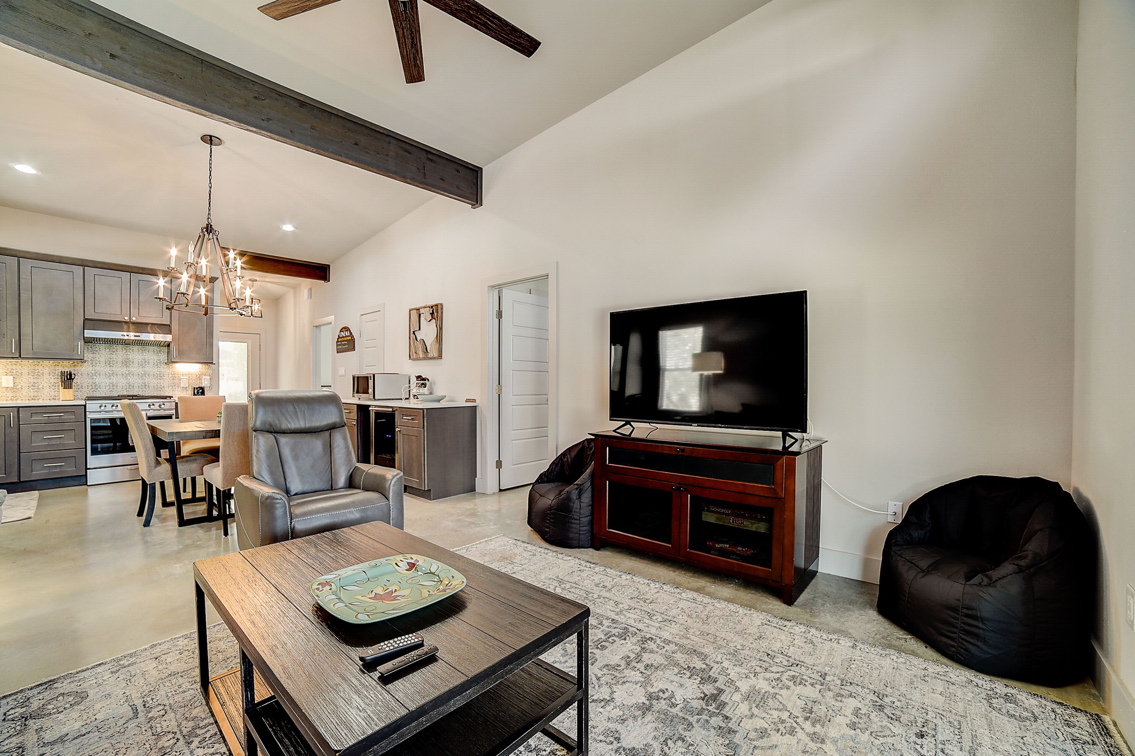 Dog-friendly home with private hot tub, porch, grill, AC, & W/D