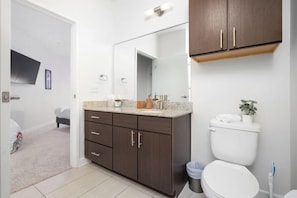 Bathtub, hair dryer, towels