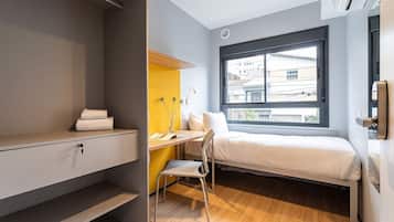 Desk, laptop workspace, free WiFi, bed sheets