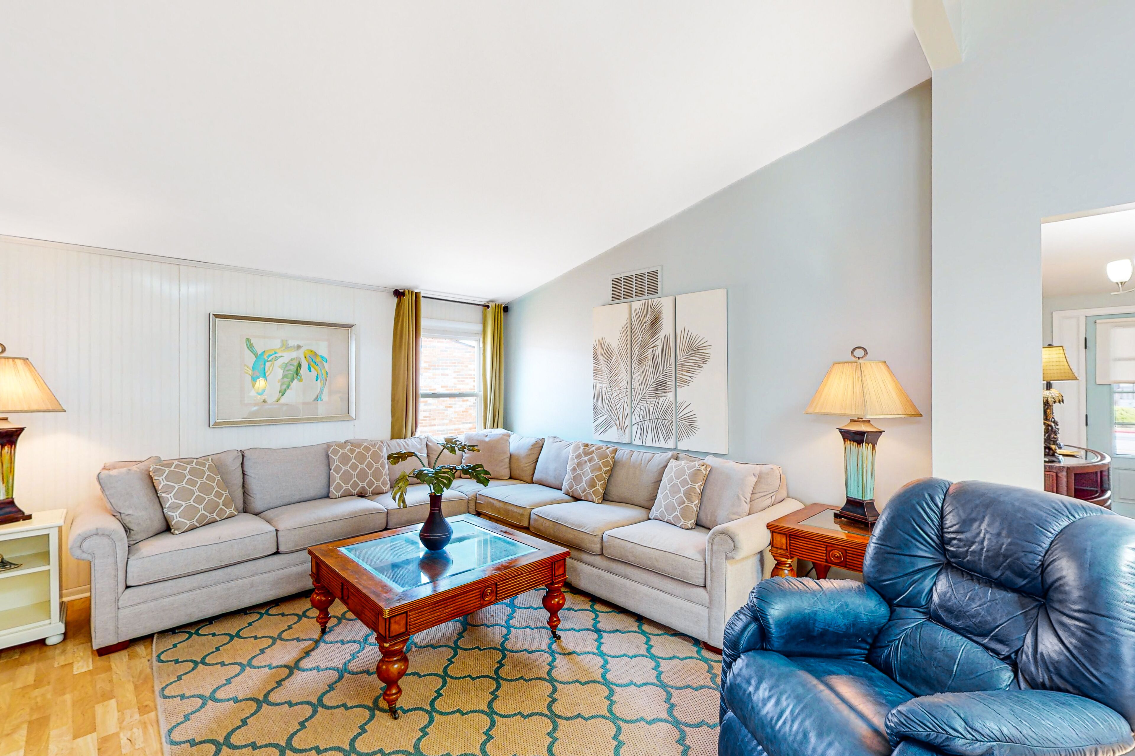 Waterfront beauty with a deck, grill, washer/dryer, and AC - central location