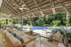 Outdoor dining - Tortuga B55: Renovated serene villa near beach w/ pool, staff, and golf carts (Punta Cana)