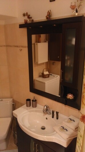 Jetted bath, hair dryer, towels, soap