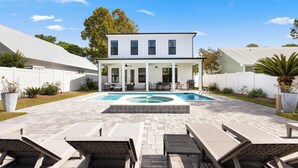 A two-story house with a covered patio and a swimming pool. - Seagrove Beach - Private Pool + Spa - Bikes (Seagrove)