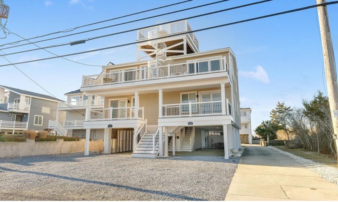 Exceptional Beach facing townhome with stunning Ocean and Bay views