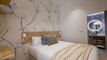 Een strijkplank/strijkijzer, gratis wifi, beddengoed