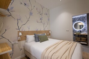 Tabla de planchar con plancha, wifi gratis y ropa de cama 