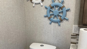 Shower, towels, toilet paper