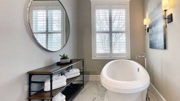 Shower, jetted tub, rainfall showerhead, hair dryer