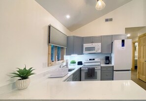 Fridge, microwave, oven, coffee/tea maker