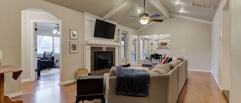 TV, fireplace, books, offices