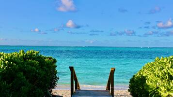 On the beach, sun loungers, beach towels
