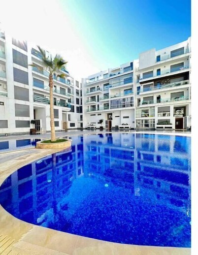 Chic 2BR Getaway with Large Balcony & Central AC