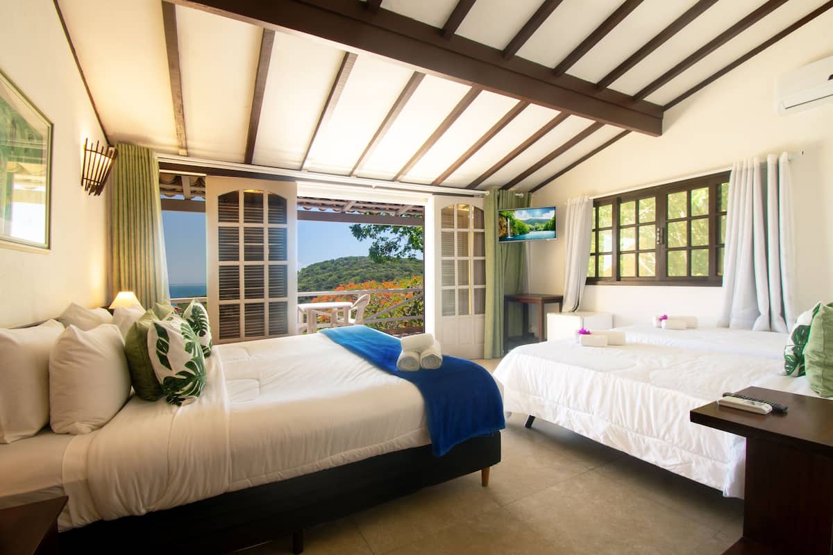 Standard Quadruple Room | In-room safe, desk, free WiFi, bed sheets