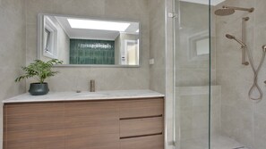 Bathtub, hair dryer, towels