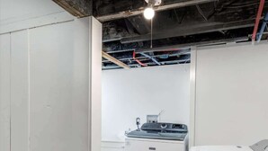 A laundry room with a washing machine, dryer, and a small sink. - Sleeps 14! 10 Mins to Downtown + Driveway Parking (Detroit)