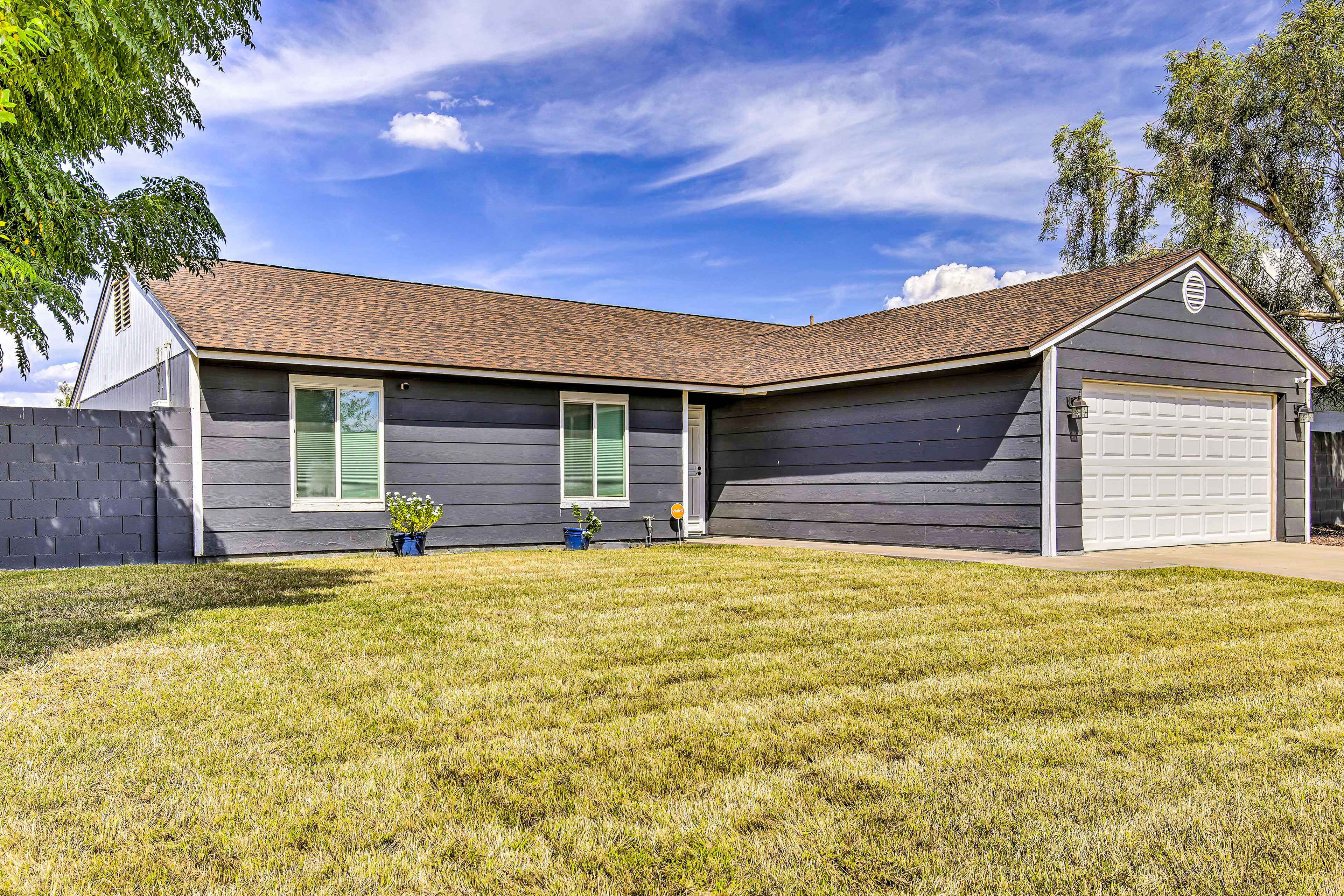 Single-level dog-friendly home with private pool, grill, enclosed backyard, & AC