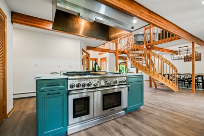 Dog-friendly home with pools, tennis, game room, pool table, firepit, fireplace