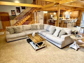 Large, cozy sectional offers plenty of seating with gas fireplace