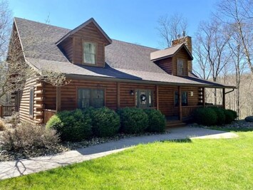 Front porch offers swing and additional seating for four.