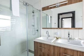 Shower, hair dryer, towels, soap