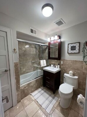 Hair dryer, towels, soap, shampoo