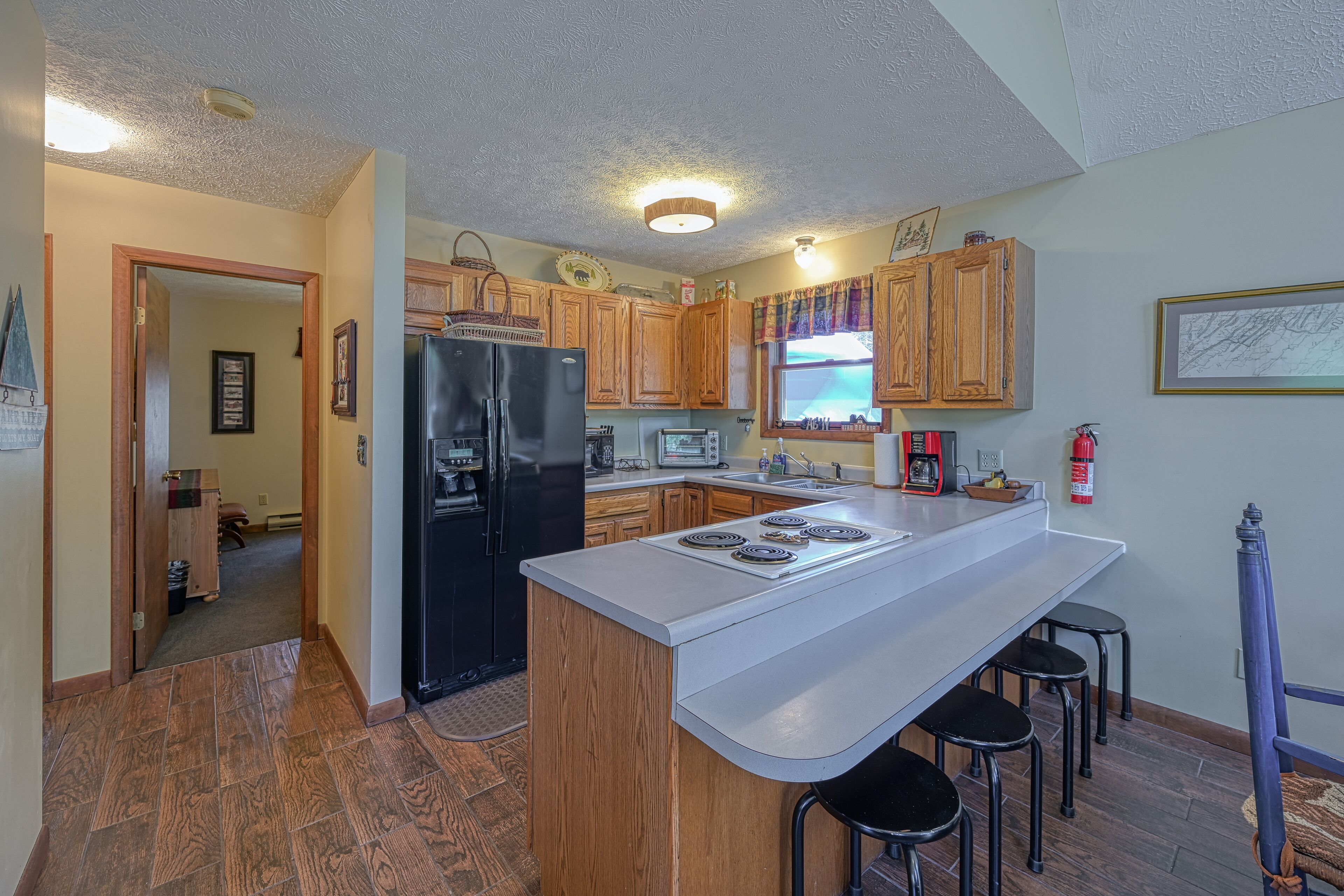 2-story home with private hot tub, firepit, deck, grill, wood stove, W/D, lawn