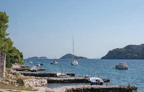 Enjoy serene harbor views from the comfort of your accommodation.