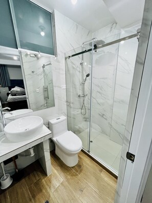 Hair dryer, towels, soap, shampoo