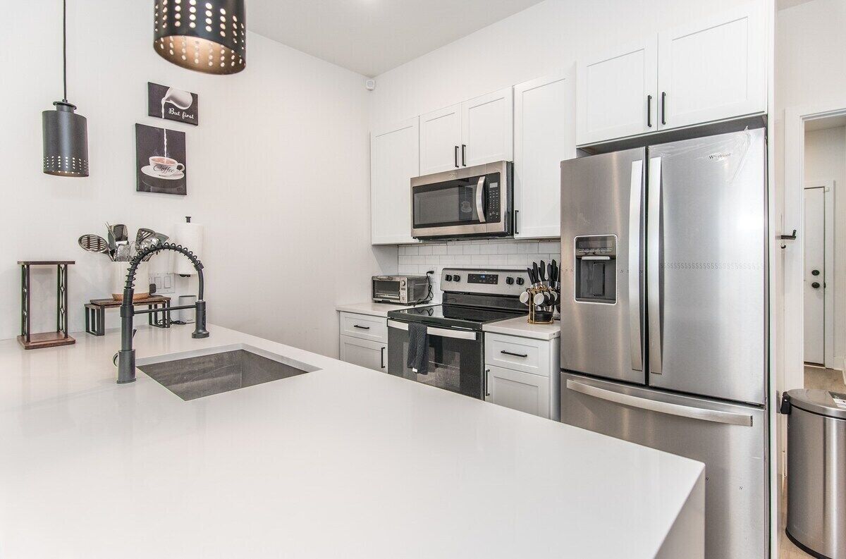 Stay in style in this thoughtfully designed and conveniently located condo