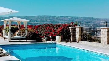 Villa, Multiple Beds | Pool | Outdoor pool, a heated pool