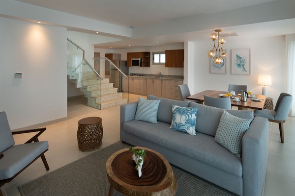 Luxury Penthouse Suite | Living area | 32-inch TV with cable channels