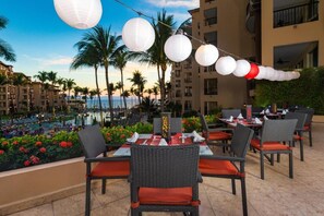 Outdoor dining - Ocean Front Suite Christmas week at Villa Del Palmar Flamingos, 2 bedroom. (Bucerias)