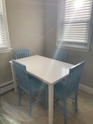 Enjoy meals in this dining area with a spacious table and comfortable chairs.