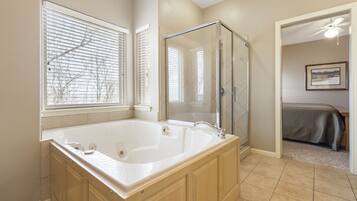 Shower, jetted tub, hair dryer, towels