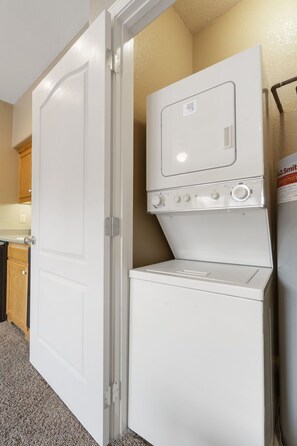 Convenient laundry facilities with a washer and dryer.