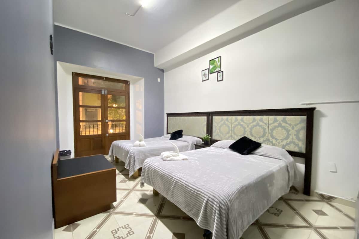 Chambre Quadruple | Draps fournis
