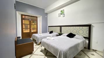 Basic Quadruple Room | Bed sheets